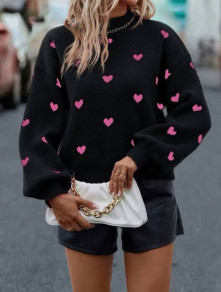 Ženski pulover s srčki K18152 črno/roza
