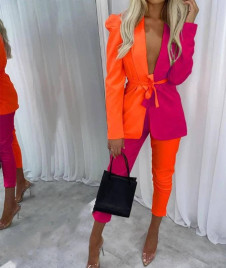 Ženski komplet suknjič in hlače 1170 oranžna/ciklama
